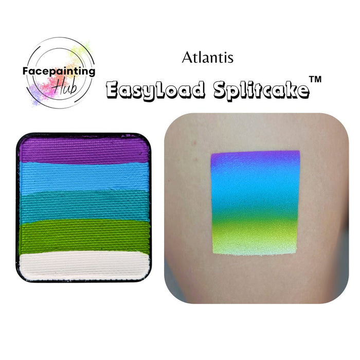 Facepainting powder cake in the shade Atlantis, showing both the pressed powder with horizontal color bands and a swatch applied to skin, featuring purple, blue, green, and white stripes.