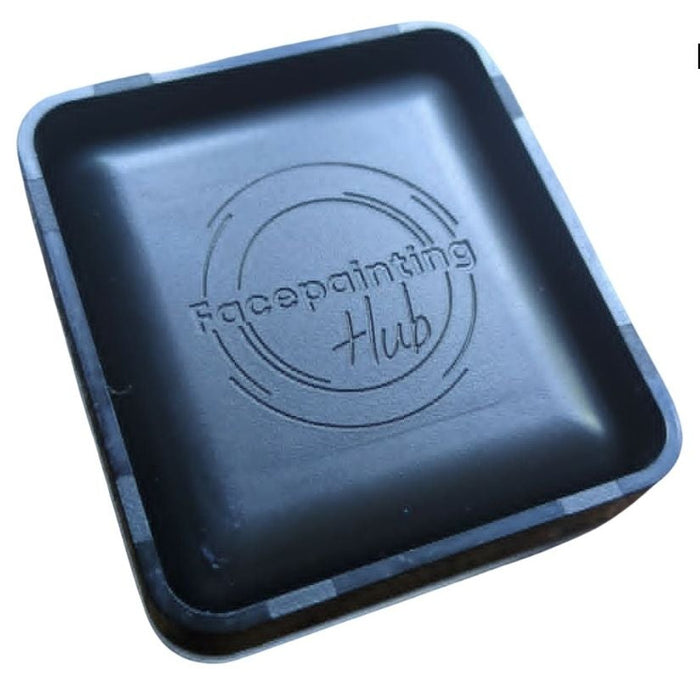 Empty EasyLoad splitcake face paint pan with lid open