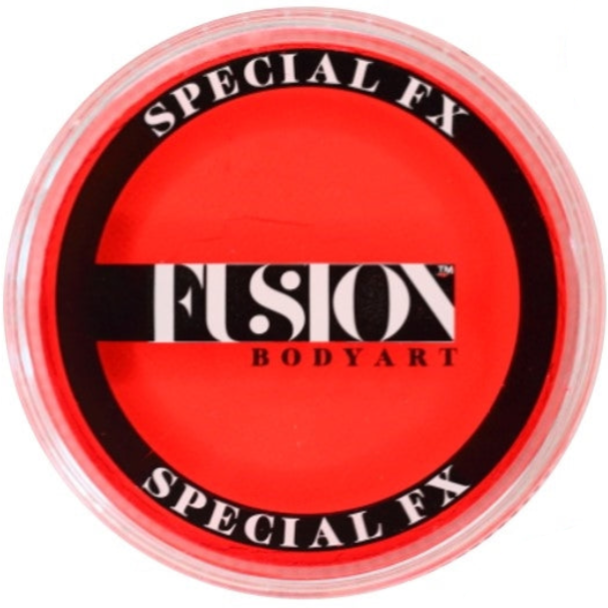 A close-up of a round plastic pot of red special effects body art paint with a black and white label reading 'SPECIAL FX FUSION BODYART'.