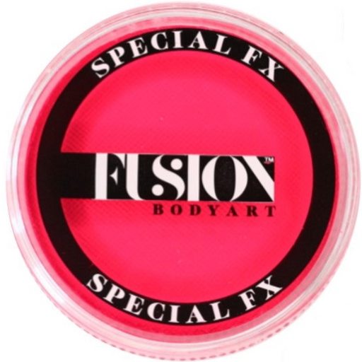 A round plastic container of Fusion Bodyart Special FX makeup in a bright hot pink shade, shown on a white background with a small inset showing the product under UV light.