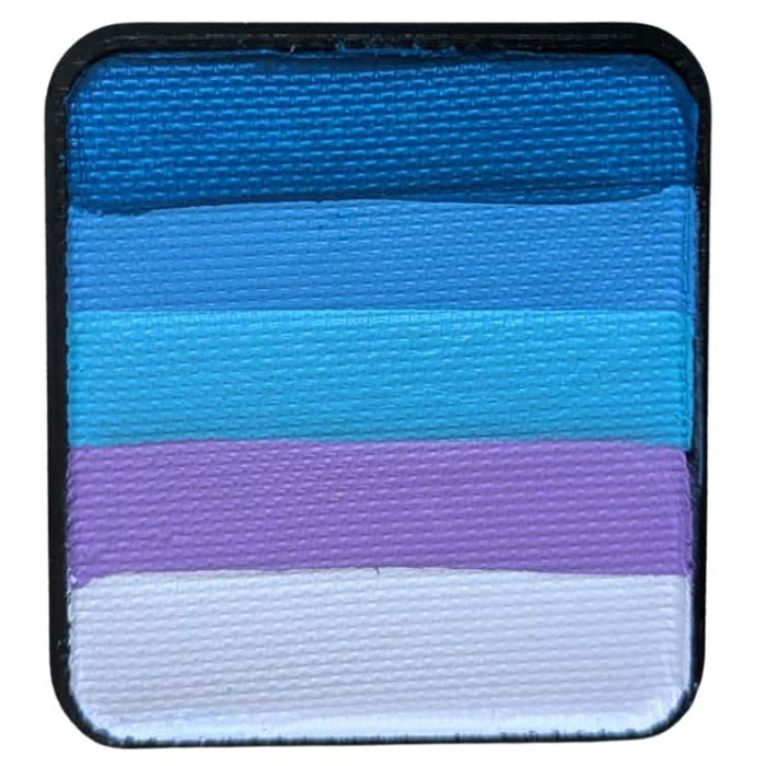 Rainbow face paint with blues and purples like a frozen ice queen theme 