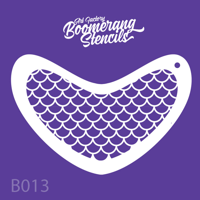 Boomerang stencil with fish scale pattern on a purple background