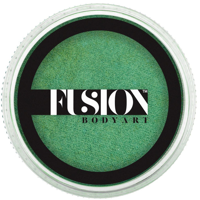 Green face paint in a Fusion Body Art container on a white background