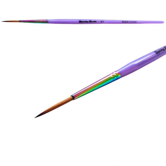 Two fine paint brushes with light purple handles and iridescent rainbow ferrules, shown on a white background with the text 'Stardust 1.9cm Liner' below.