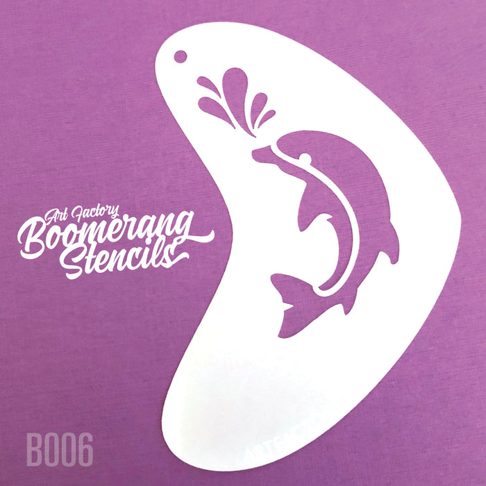 A white, dolphin-shaped stencil with a splash design, displayed on a purple background