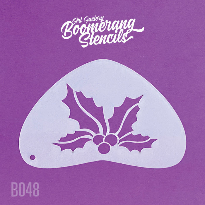 A purple and white boomerang-shaped stencil with a mistletoe and holly design